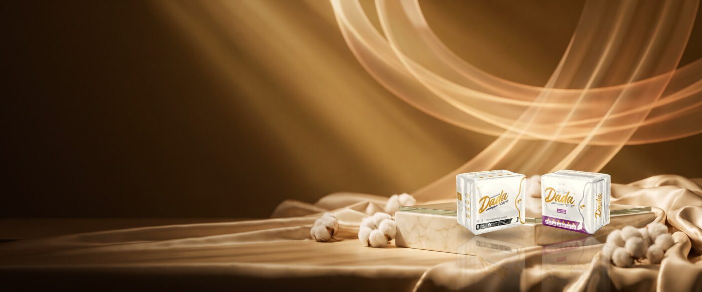 Dadacare Plus pads on a champagne and rose-gold stage