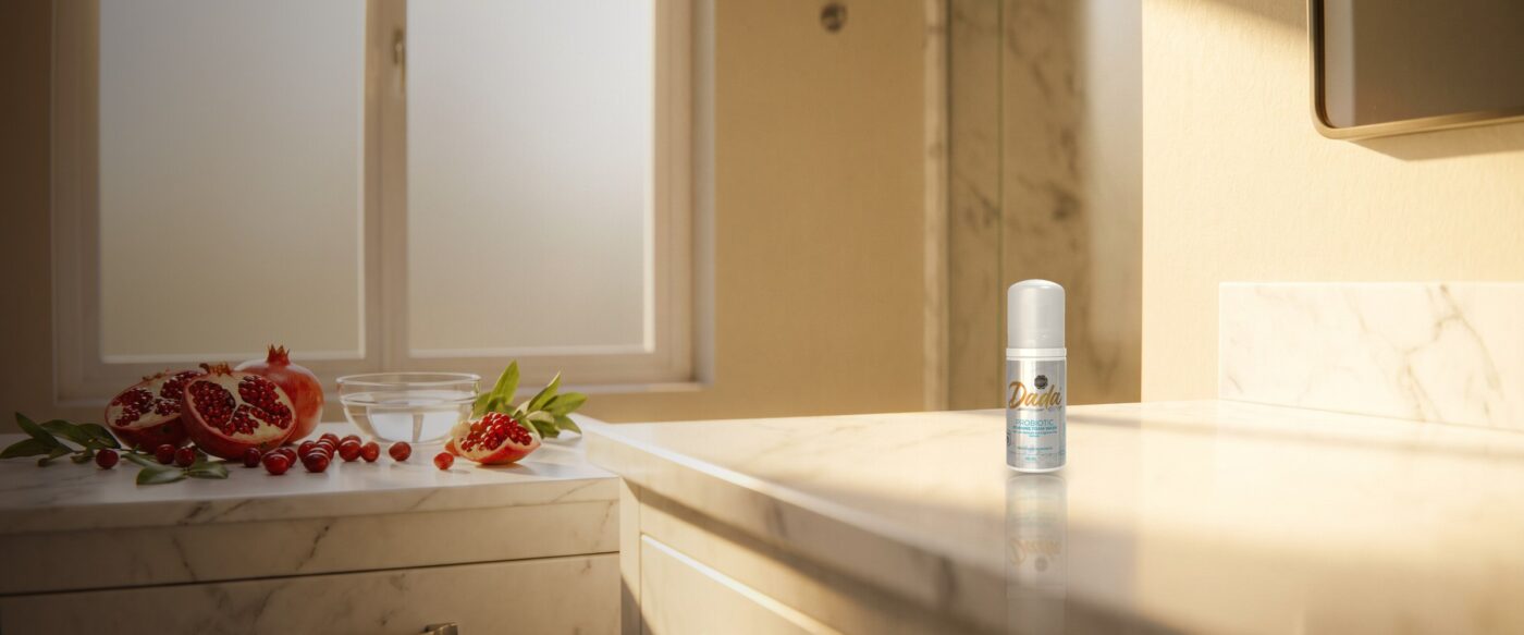 Dadacare Plus probiotic foam wash on a marble vanity in morning light